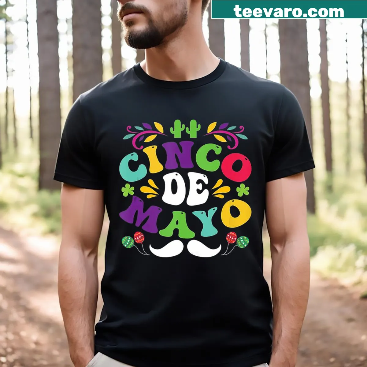 Cinco De Mayo T-shirt with mustache, cactus, and maracas graphic. — on a men's t-shirt