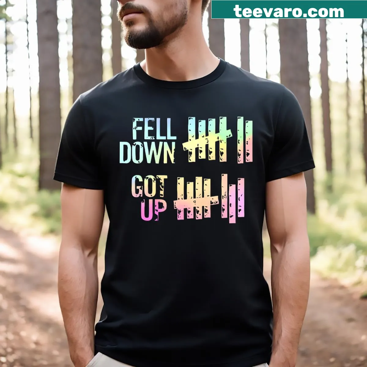Inspirational typography t-shirt with 'Fell Down Got Up' text — on a men's t-shirt