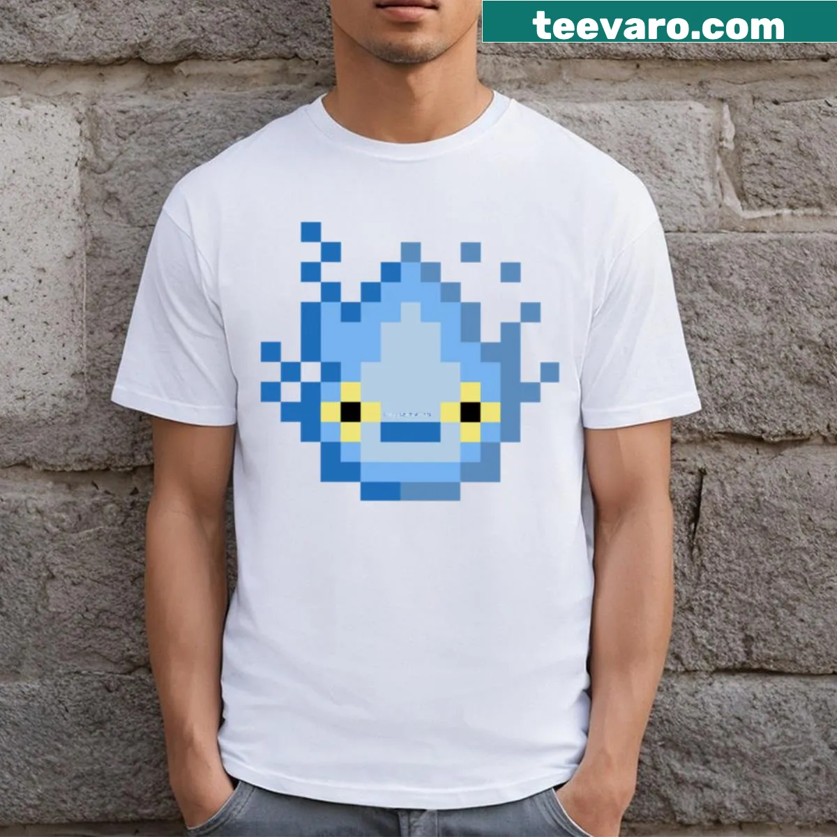 Minimalist T-shirt featuring a blue graphic of Calcifer, the fire demon. — on a men's t-shirt