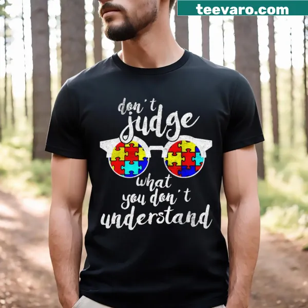 T-shirt with bold typography saying 'Don't Judge - Understand'