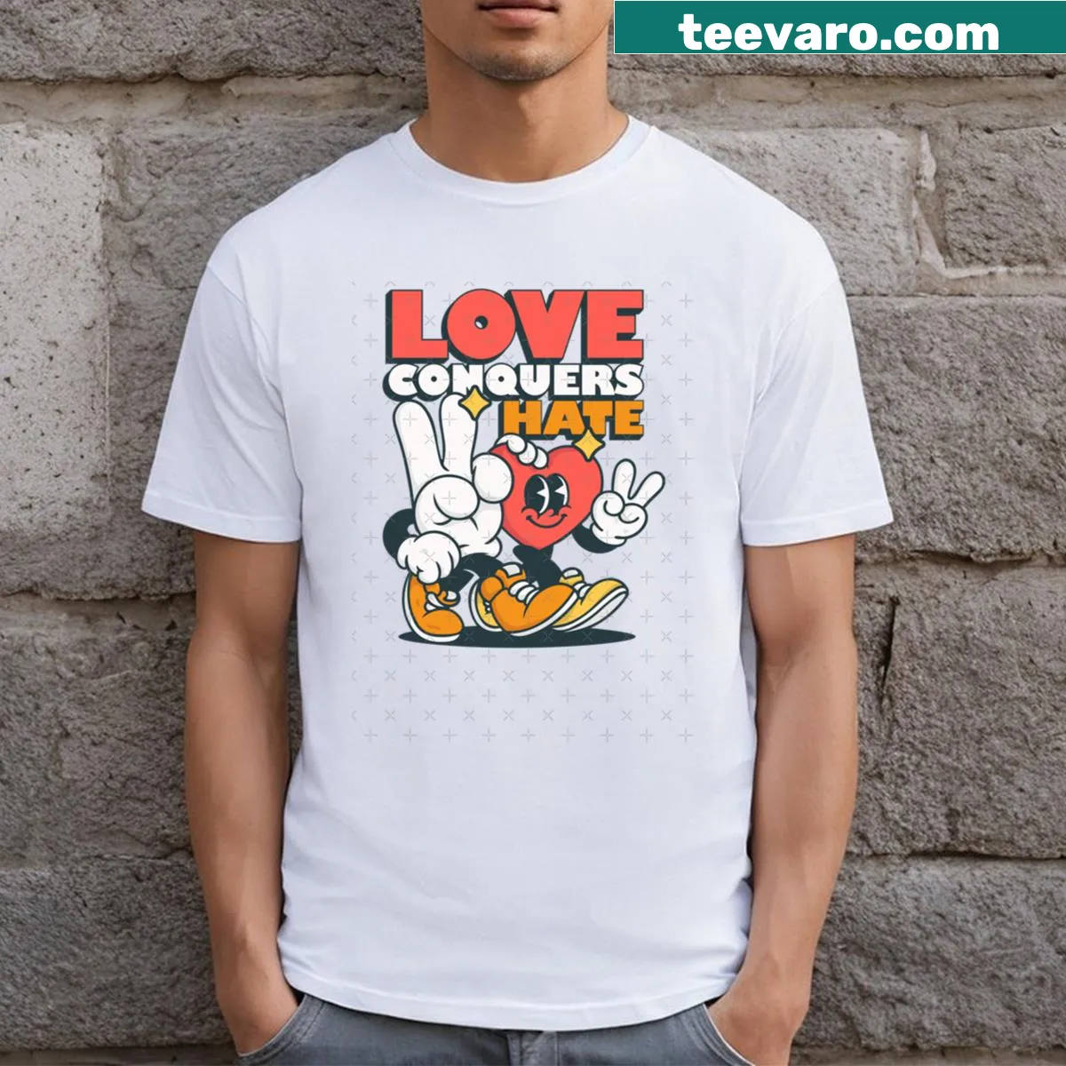Inspirational T-shirt with the phrase 'Love Conquers Hate' in bold design. — on a men's t-shirt