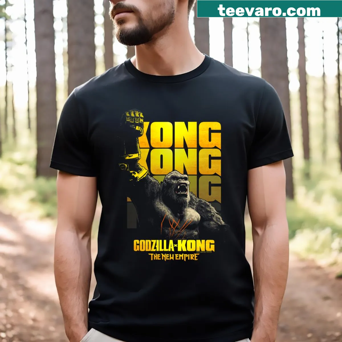 T-shirt featuring Godzilla and King Kong graphic design — on a men's t-shirt