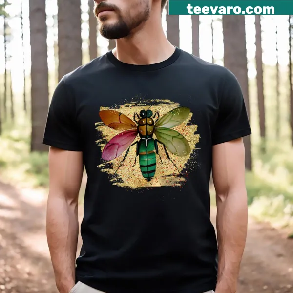 Watercolor painting of a green glitter bug on a t-shirt