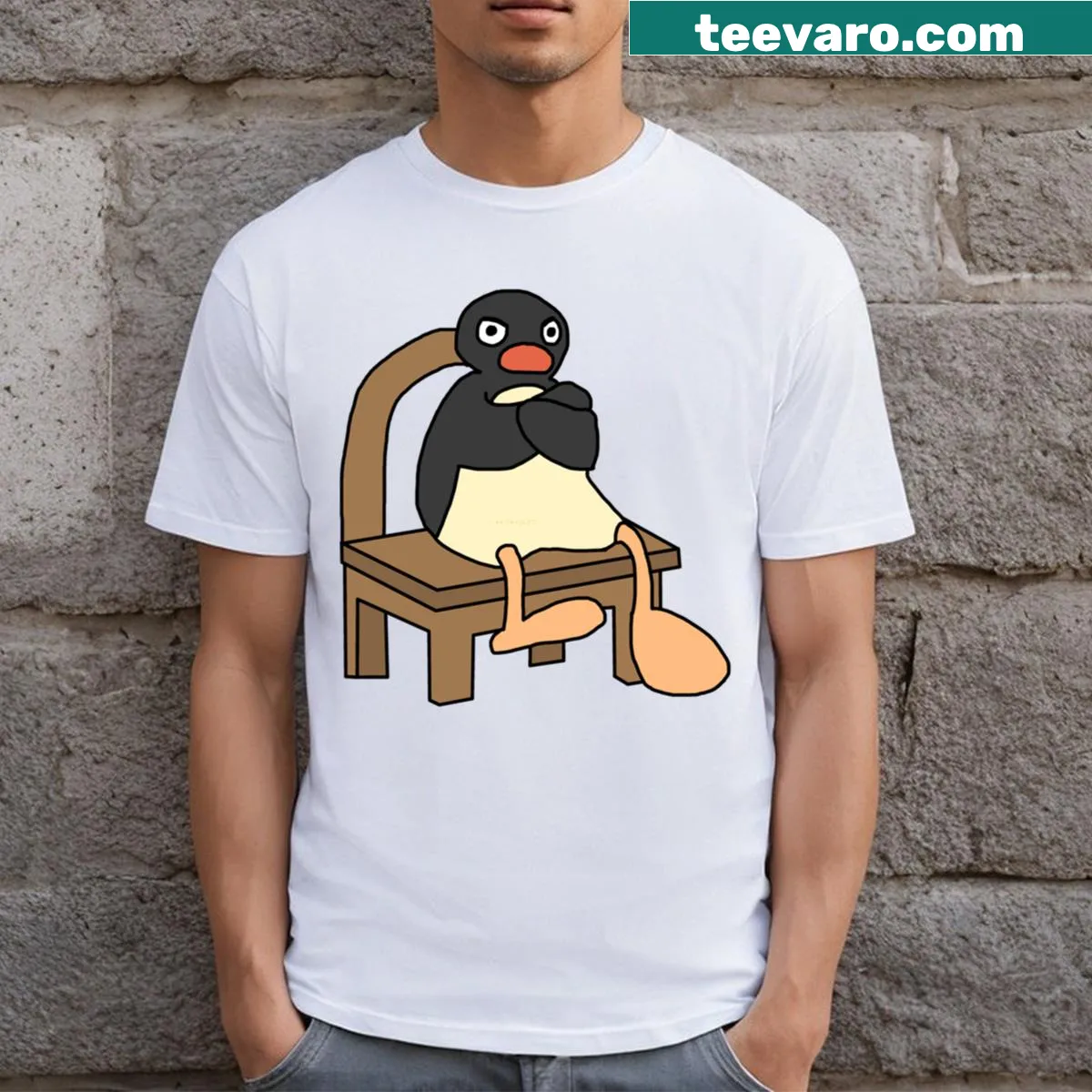 Funny cartoon T-shirt featuring an angry penguin — on a men's t-shirt