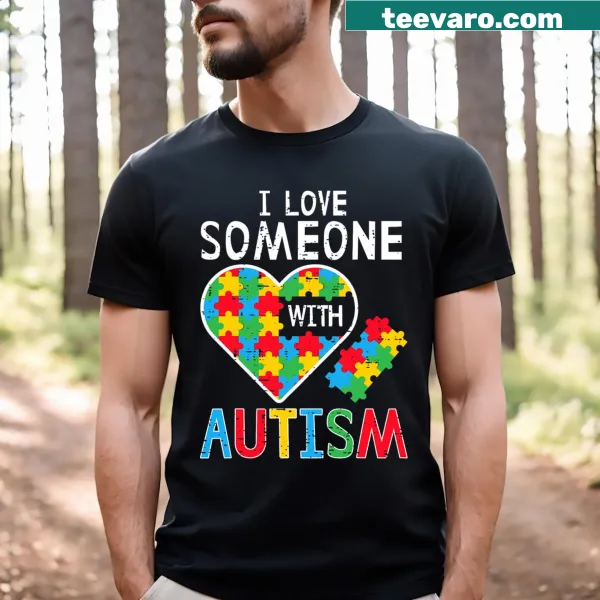 Heart graphic T-shirt with 'I Love Someone With Autism' text