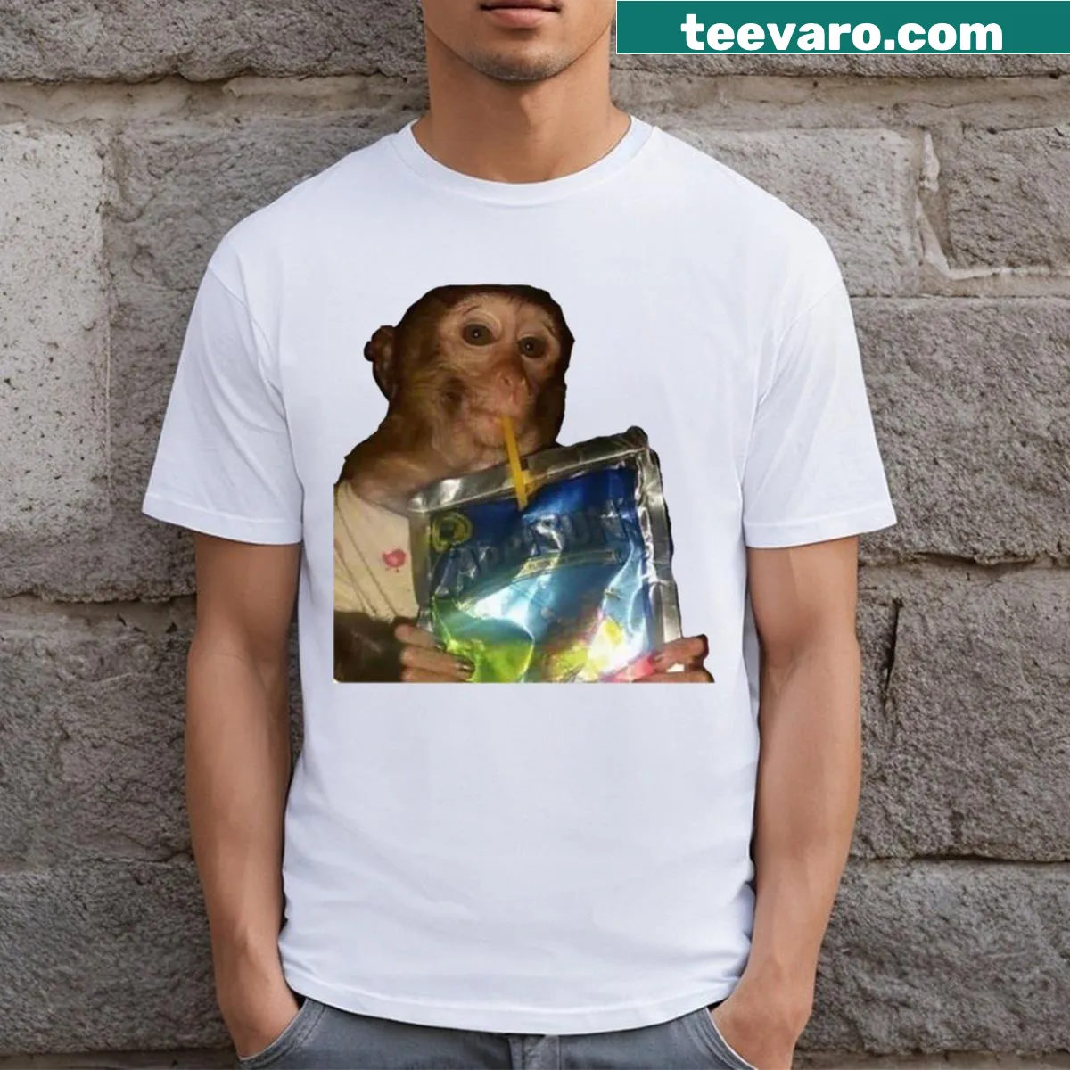T-shirt featuring a whimsical monkey sipping a Caprisun drink — on a men's t-shirt