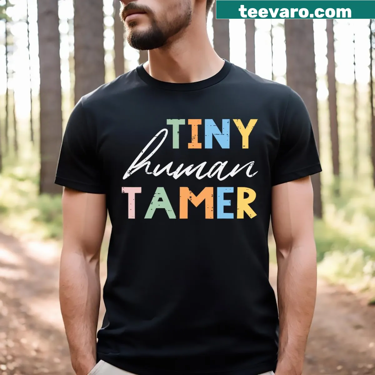 Cute T-shirt for preschool teachers with the phrase Tiny Human Tamer — on a men's t-shirt