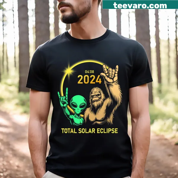 Fun graphic tee featuring a solar eclipse, aliens, and Bigfoot