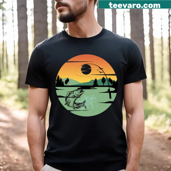Illustrative fishing T-shirt depicting a fisherman by a lake