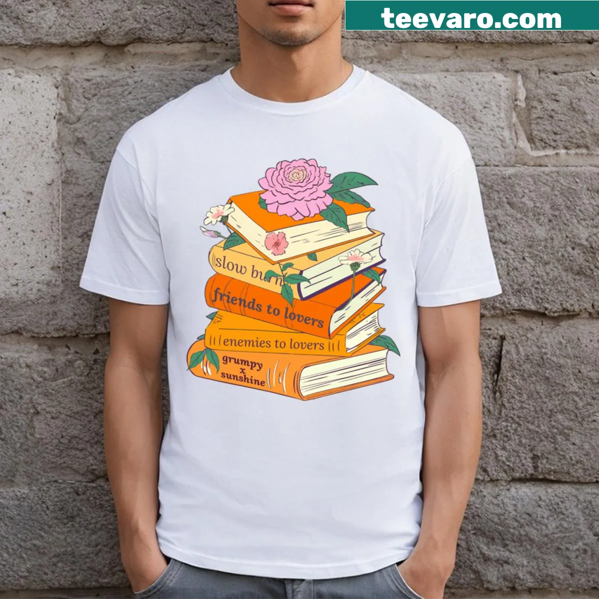 T-shirt featuring a pile of romance books with flowers in a playful design. — on a men's t-shirt