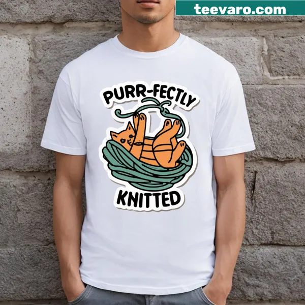Illustrated cat playfully tangled in yarn on a knitted design t-shirt