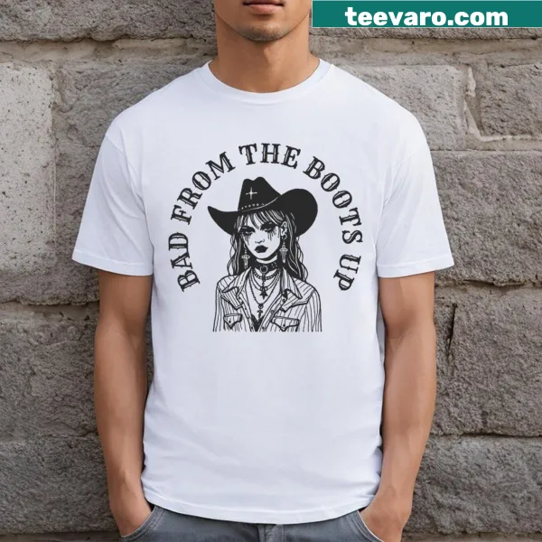 Cowgirl T-shirt with the phrase 'Bad From The Boots Up' in bold typography