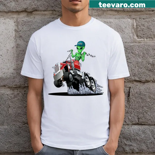 T-shirt featuring a cartoon alien driving a truck.