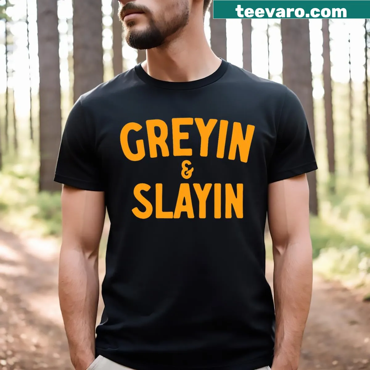 Funny workout t-shirt with 'Greyin And Slayin' text — on a men's t-shirt