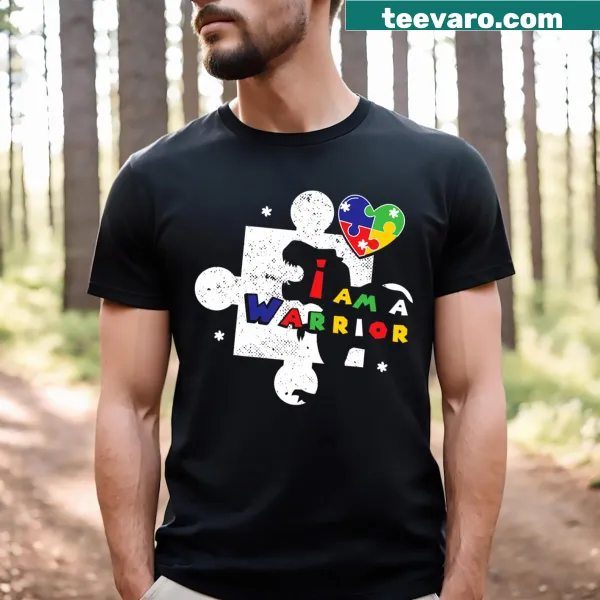 Cartoon dinosaur graphic with the phrase 'I Am A Warrior' on a kids t-shirt