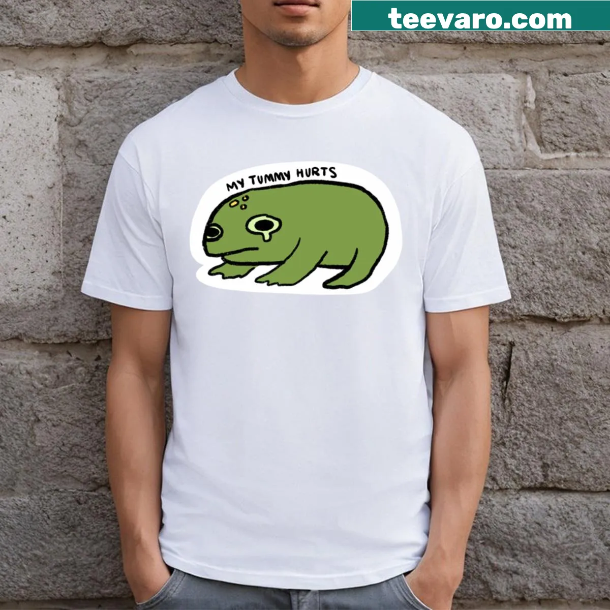 Cartoon frog holding its belly on a humorous t-shirt — on a men's t-shirt