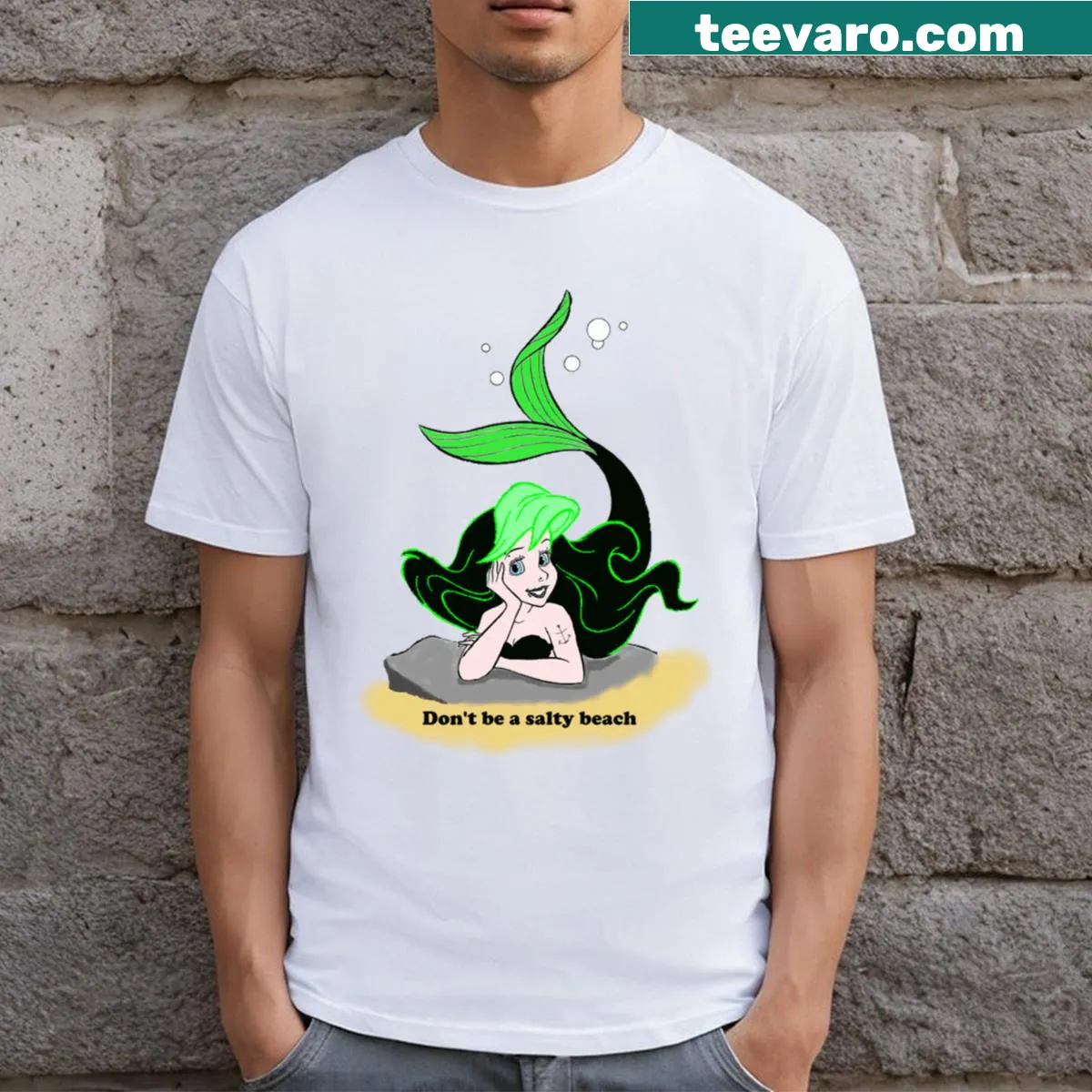 Playful 'Salty Beach' T-shirt with whimsical beach-related graphics — on a men's t-shirt