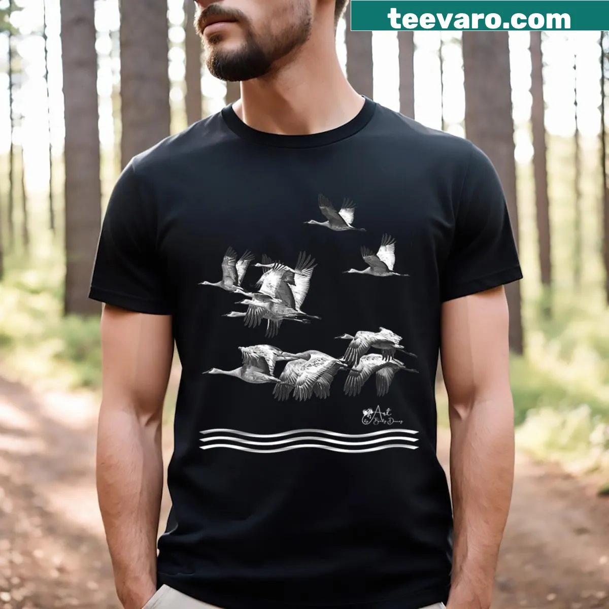Black and white illustration of sandhill cranes flying above waves — on a men's t-shirt