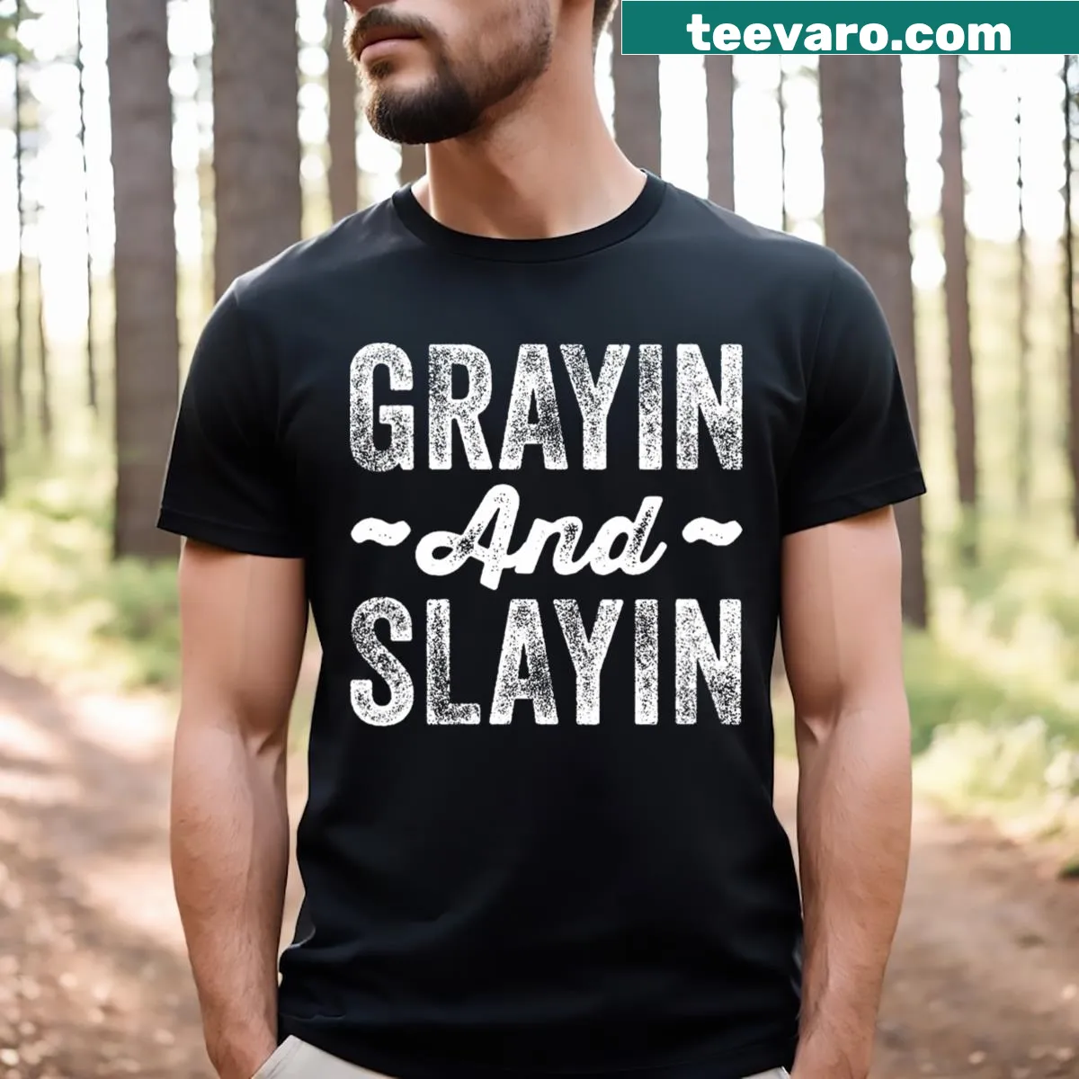 Funny gym T-shirt with the phrase 'Grayin And Slayin' in bold text — on a men's t-shirt