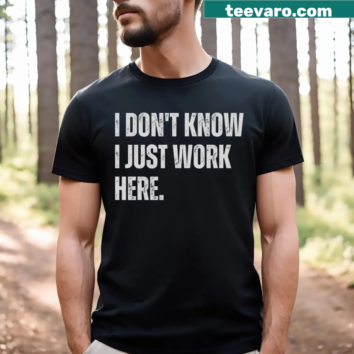 Funny sarcastic saying t-shirt with text 'I Don't Know I Just Work Here' — on a men's t-shirt