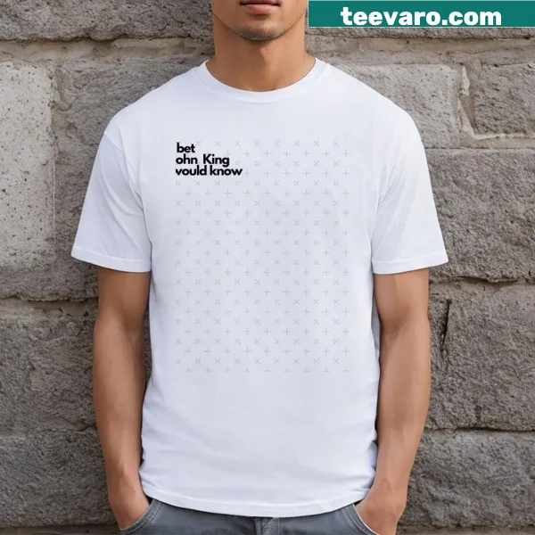 Text referencing John King on a casual T-shirt.