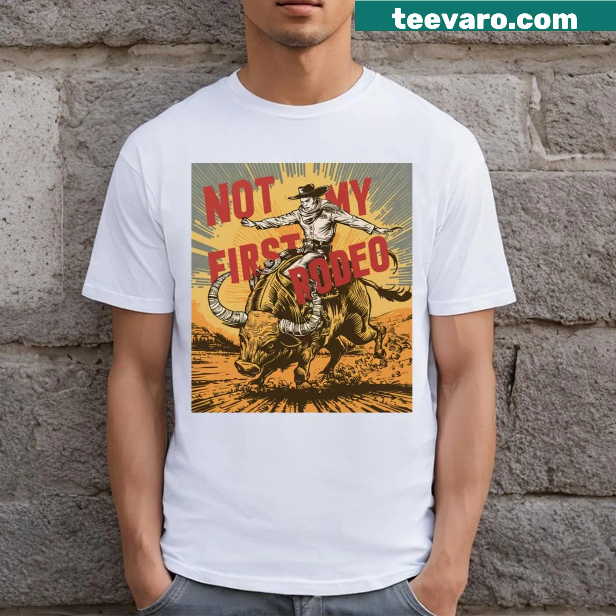 T-shirt with 'Not My First Rodeo' text — on a men's t-shirt