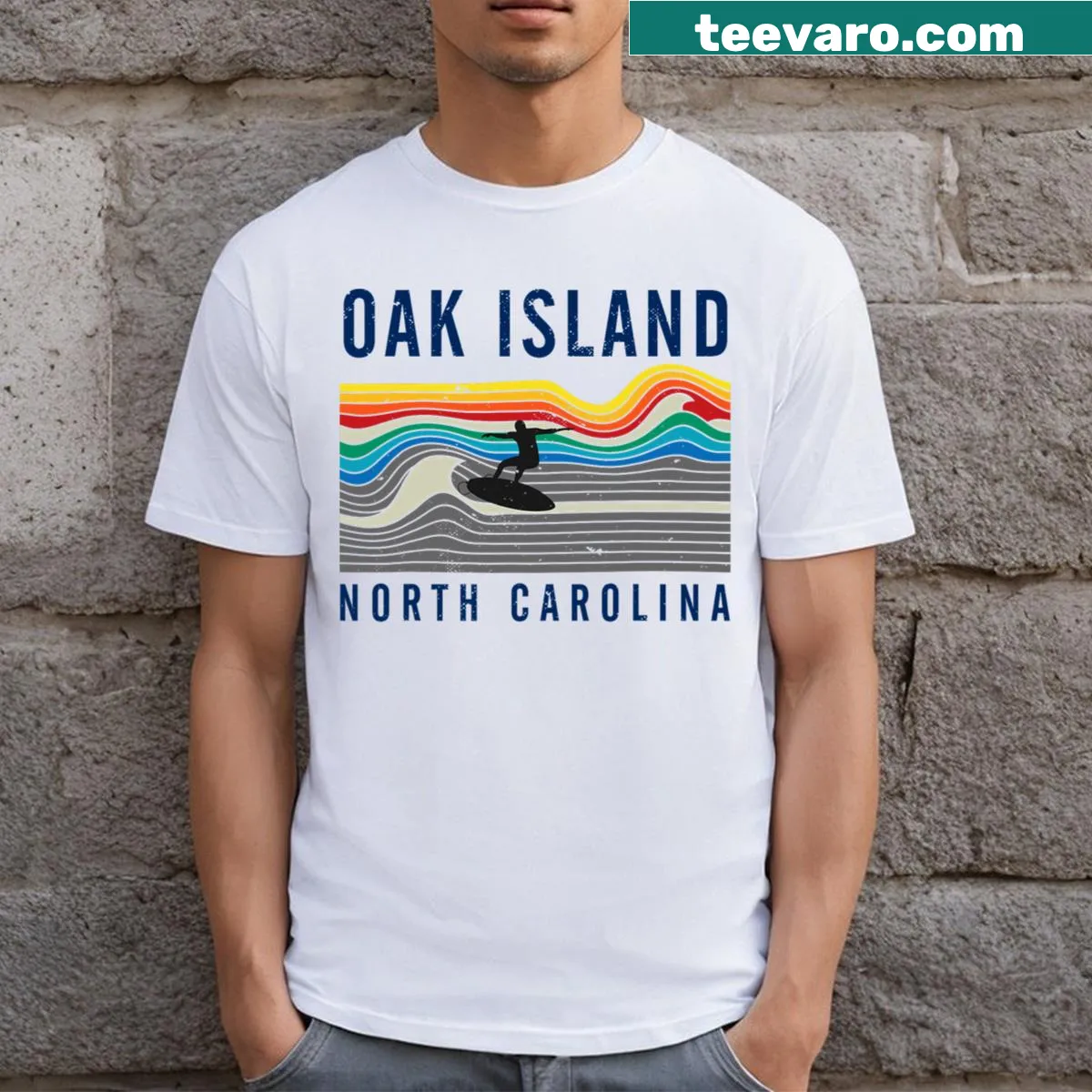 Surfing-themed Oak Island beach T-shirt with playful graphics — on a men's t-shirt