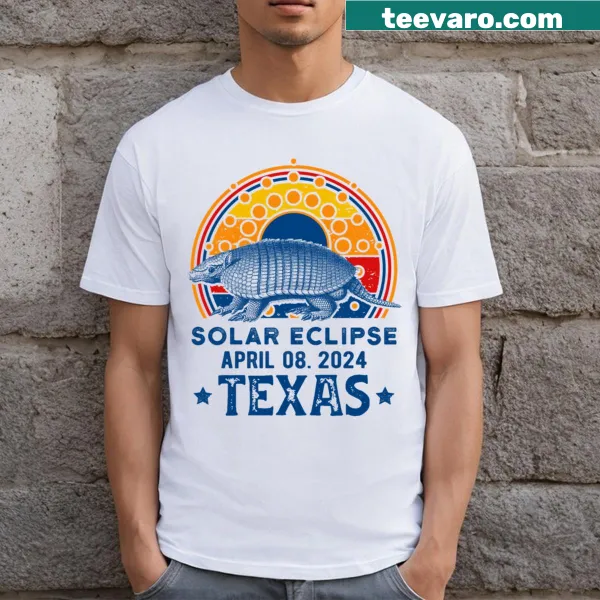 Graphic t-shirt featuring a Texas armadillo and solar eclipse theme
