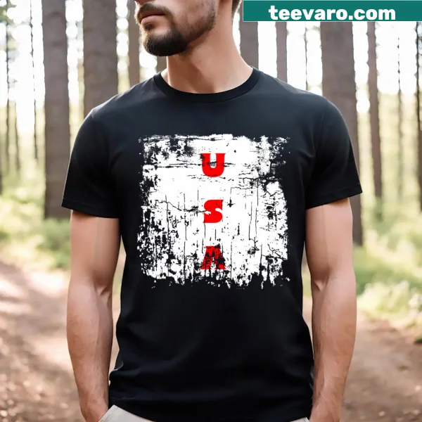 Minimalist t-shirt with faded USA initials for a subtle patriotic look.