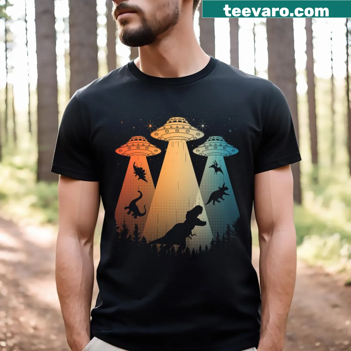 Cartoon dinosaur and UFO alien abduction graphic T-shirt — on a men's t-shirt