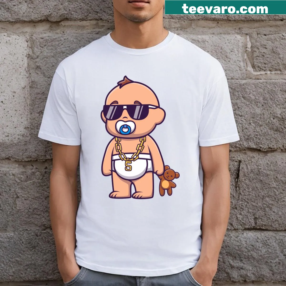 Cute baby holding a teddy bear cartoon graphic on a t-shirt — on a men's t-shirt