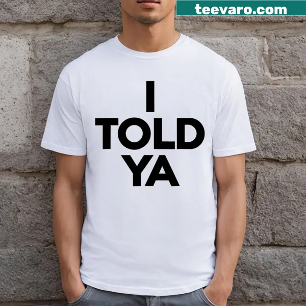 Sporty T-shirt with 'I Told Ya Tennis' text for tennis enthusiasts.