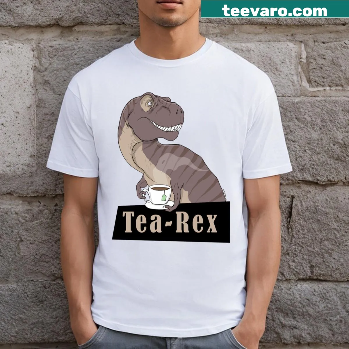 Cartoon dinosaur holding a cup of tea on a playful t-shirt — on a men's t-shirt