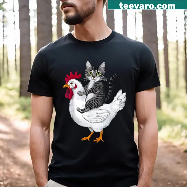 Quirky graphic of a cat riding a chicken on a humorous t-shirt