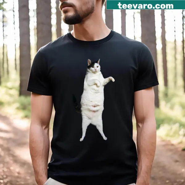 Relaxed fit t-shirt featuring playful dancing cartoon kittens