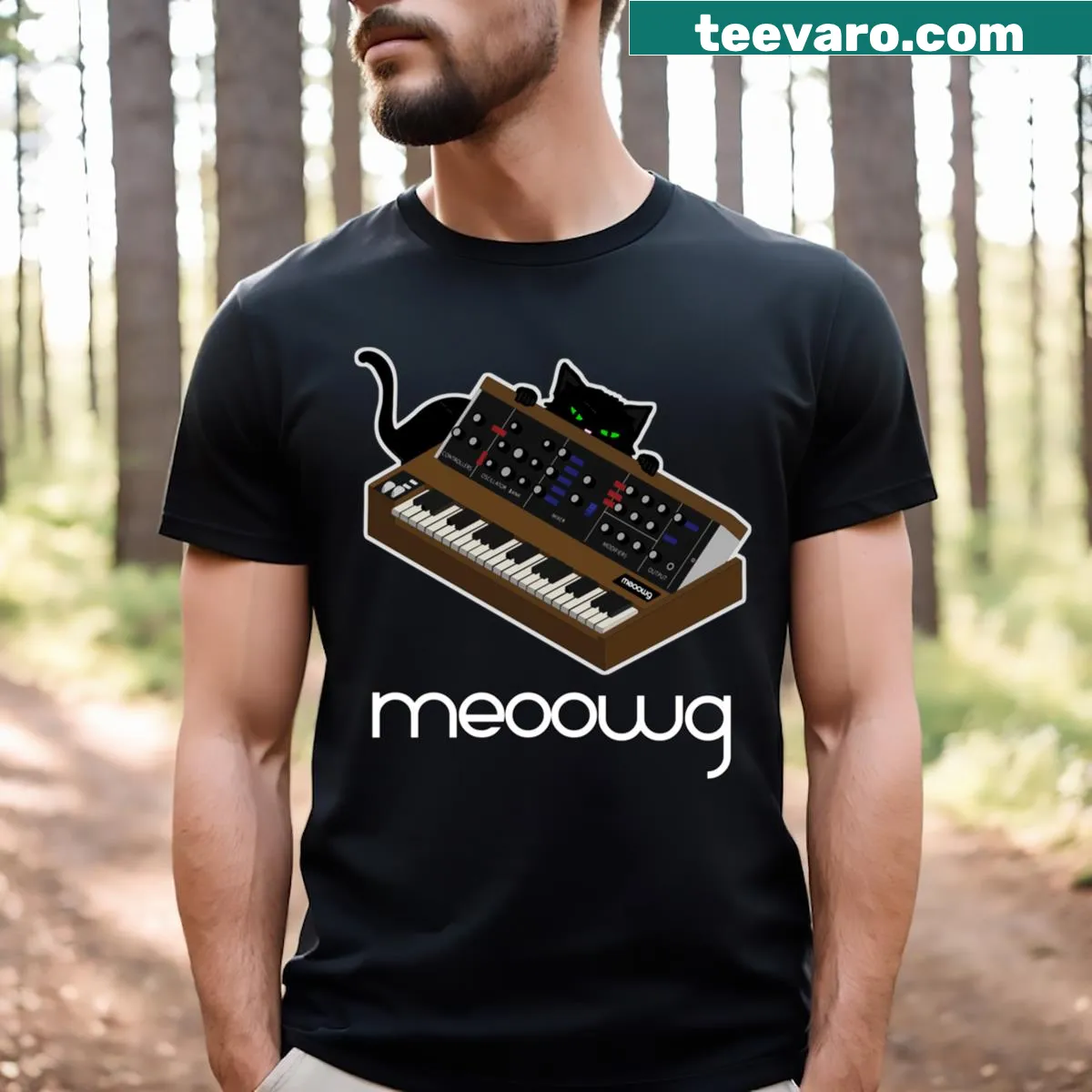 Cartoon T-shirt featuring a cat playing a synthesizer, perfect for music and cat lovers. — on a men's t-shirt