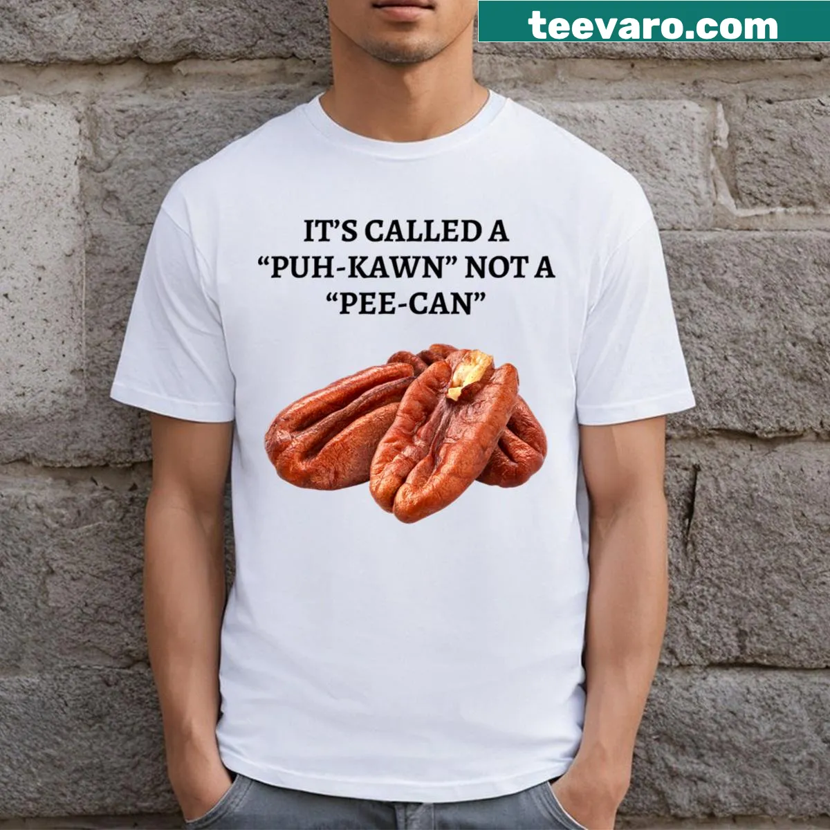 Funny pecan pronunciation t-shirt with playful text design — on a men's t-shirt