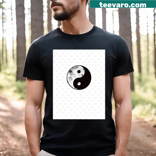Worn graphic t-shirt featuring a stylized Yin Yang symbol