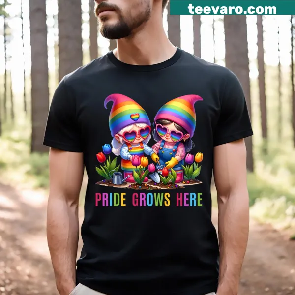 Cartoon design of rainbow gnomes in a tulip garden on a T-shirt.