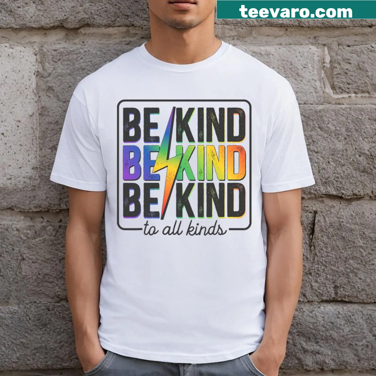 Retro style T-shirt featuring the LGBTQ+ rainbow flag and 'Be Kind' text. — on a men's t-shirt