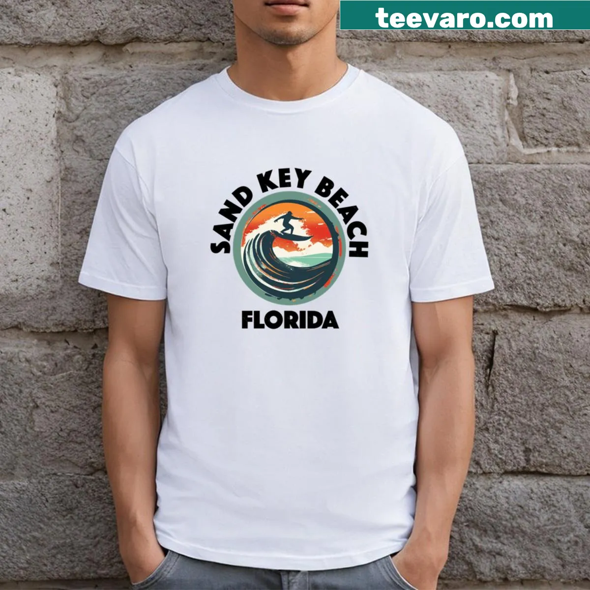 Black lettering Sand Key Beach t-shirt — on a men's t-shirt