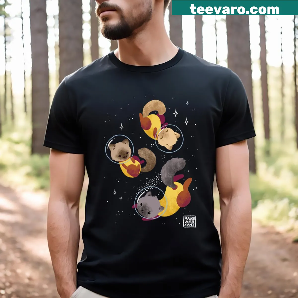 T-shirt depicting cats in space with astronaut gear — on a men's t-shirt