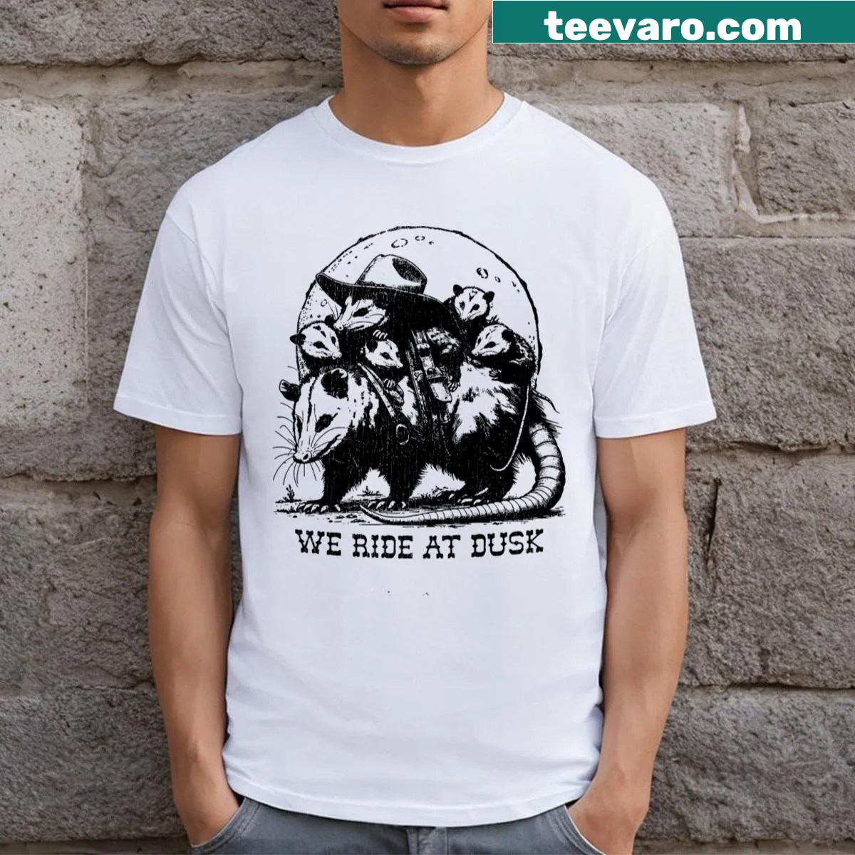 Silhouette of riders against a dusky sky on a t-shirt — on a men's t-shirt
