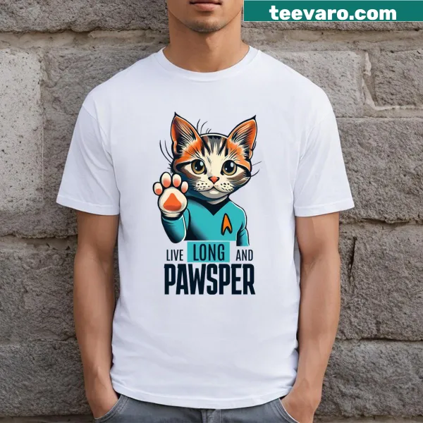 Whimsical typography saying 'Live Long And Pawsper' on a cat-themed shirt.