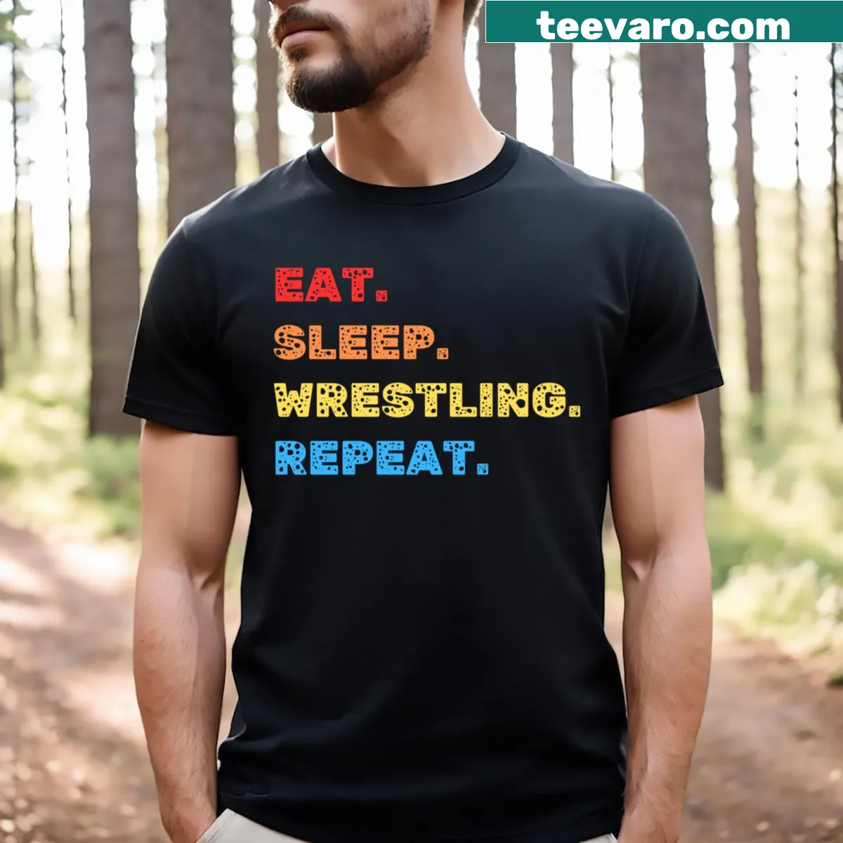 Bold text 'Eat Sleep Wrestling Repeat' sports t-shirt — on a men's t-shirt