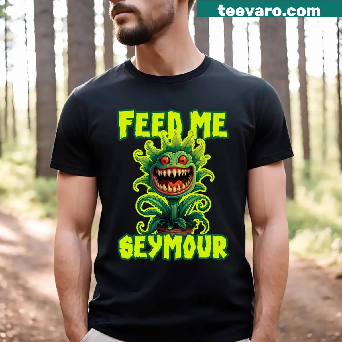Illustration of Seymour from Little Shop of Horrors with 'Feed Me' text. — on a men's t-shirt