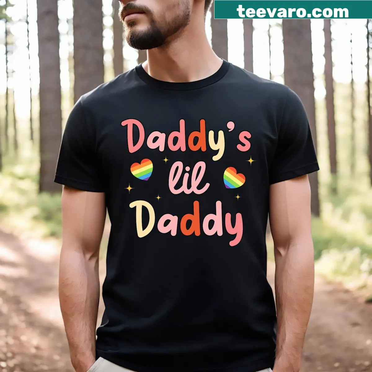 Colorful LGBTQ Pride shirt with 'Daddy's Lil Daddy' text and rainbow flag — on a men's t-shirt