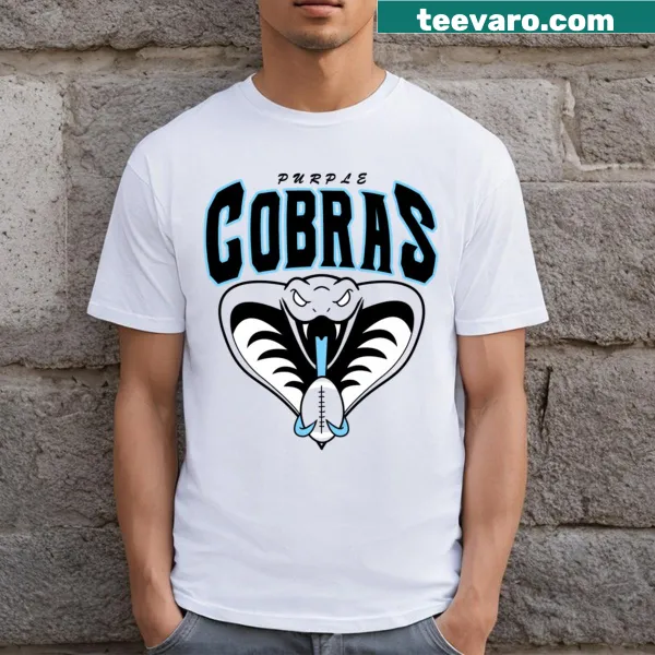 Playful illustration of a cobra on Purple Cobras t-shirt.
