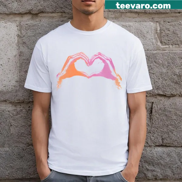 T-shirt with an illustration of hands forming a heart shape.