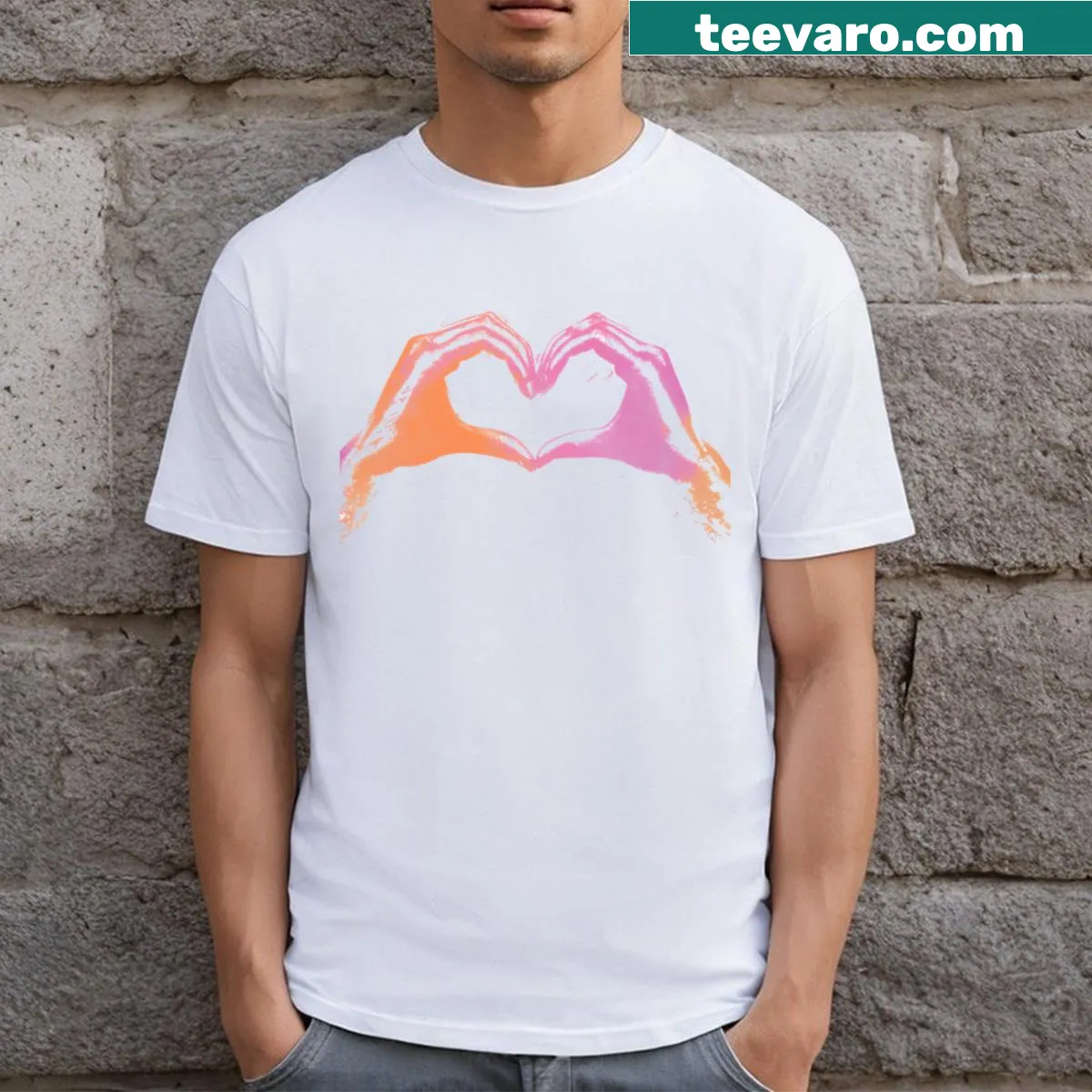 T-shirt with an illustration of hands forming a heart shape. — on a men's t-shirt